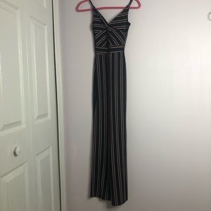 Striped red, white, and black jumpsuit